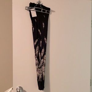 Feather studded leggings